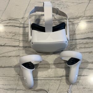 Meta Quest 2 Resident Evil 4 Bundle 128GB. White. Barely used. Great condition.